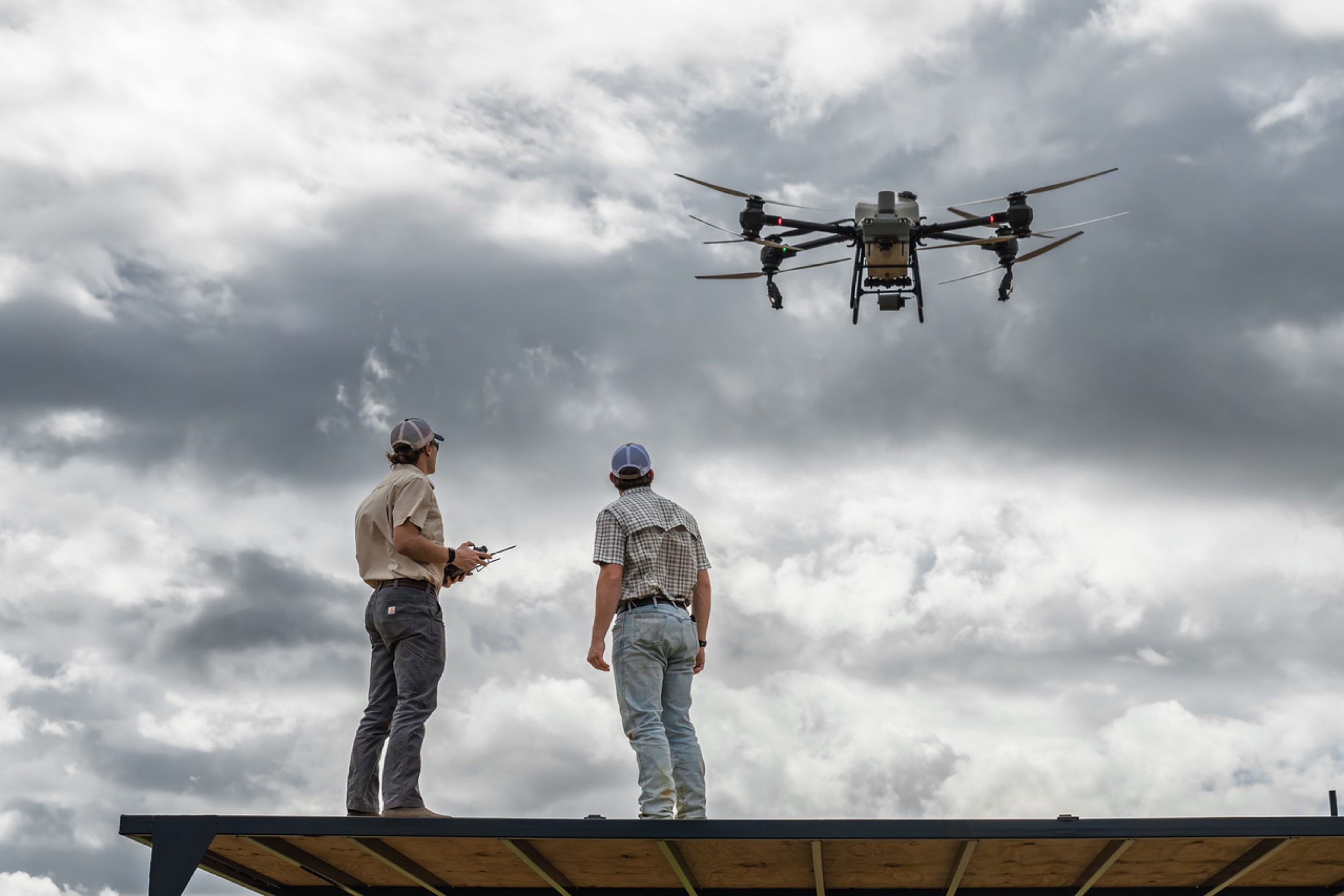 Elevated Ag founders and spray drone in the field